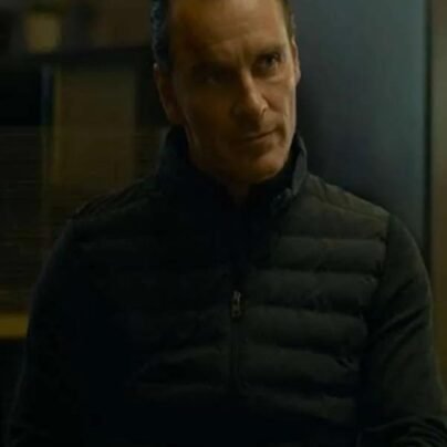 michael-fassbender-the killer-black-puffer-vest