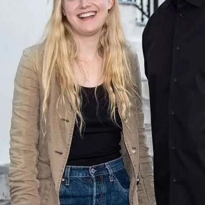 the-equalizer-3-dakota-fanning-brown-jacket